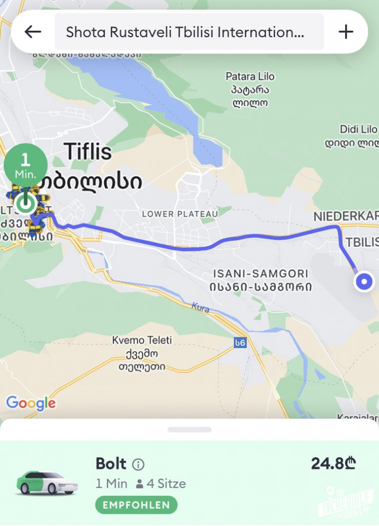 Screenshot aus der Bolt-App mit Angeboten Richtung Flughafen